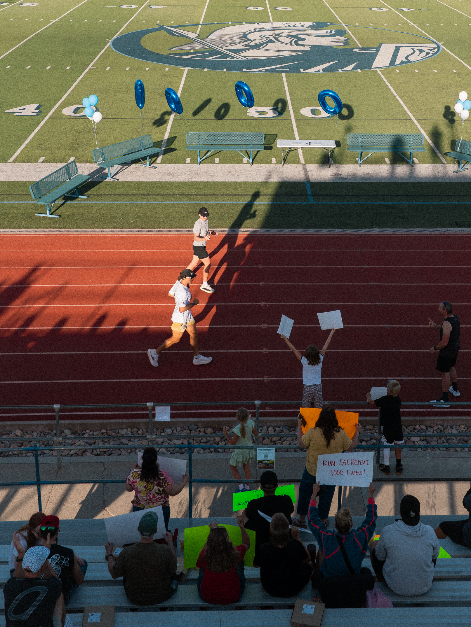 Mason running 1000 miles around the track
